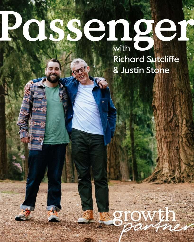 Two smiling men stand arm-in-arm in a forest, wearing casual clothes. Large text reads: Passenger with Richard Sutcliffe & Justin Stone. Bottom text says: growth partner.