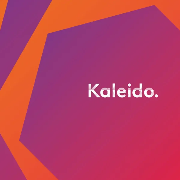 Abstract geometric background with orange and purple shapes and a gradient fill. The word Kaleido. is centred in bold white text.