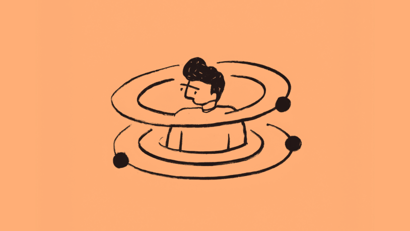A simple illustration of a person surrounded by three orbit-like rings with small dots, set against an orange background.